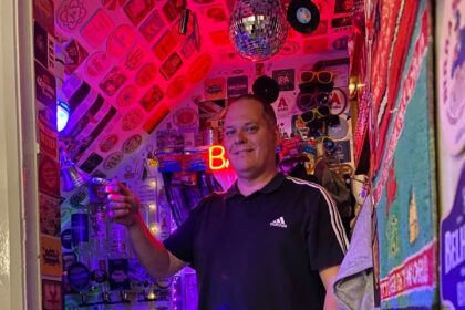 Andy Dyer, 51, transformed the cupboard under his stairs into Britain's smallest bar. With £800 spent, it's a quirky haven complete with a draft beer machine, neon sign, and disco ball.