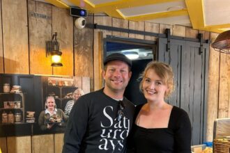 Dermot O'Leary surprised staff at Flapjackery in Wells, Somerset, with a visit after Glastonbury Festival, delighting customers as he fueled up on flapjacks from the speciality shop.