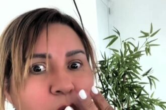 A woman waters a plastic plant for four years before realizing it's fake, sharing her funny story on TikTok. The viral video garners 7 million views and 15,000 comments.