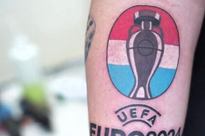 Dutch football fan Bart Blom tattoos "Uefa Euro 2024 winner" on his arm, confident of a Netherlands victory. He could win £8,400 if the Dutch team wins the championship.