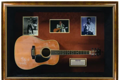 Elvis Presley's iconic Martin & Co. D-35 acoustic guitar, used in 1976 performances, is up for auction with bids expected between £11,600-£20,000. A collectible piece for music fans.