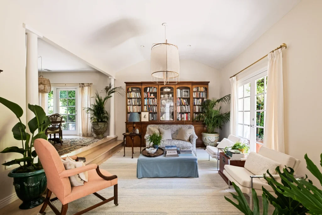 Charming West Hollywood bungalow once owned by Robert Duvall listed for $2M. Featuring Spanish-style courtyard, heated lap pool, and lush gardens. Prime location!