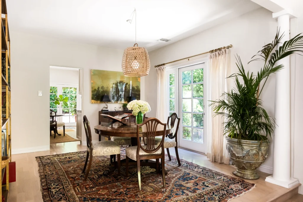 Charming West Hollywood bungalow once owned by Robert Duvall listed for $2M. Featuring Spanish-style courtyard, heated lap pool, and lush gardens. Prime location!