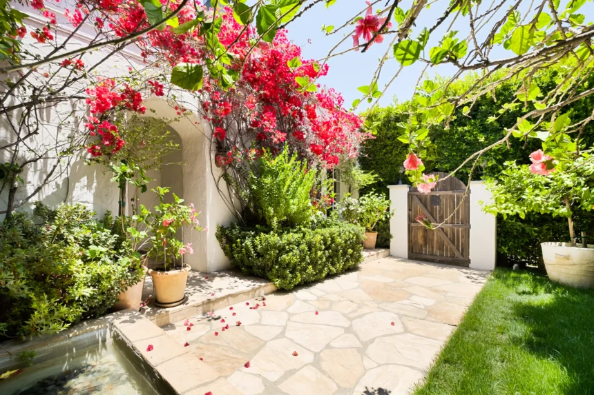 Charming West Hollywood bungalow once owned by Robert Duvall listed for $2M. Featuring Spanish-style courtyard, heated lap pool, and lush gardens. Prime location!