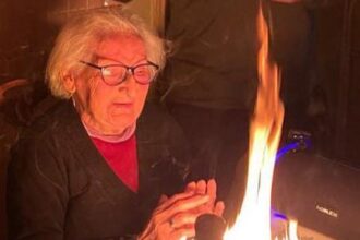 Elderly gran's 95th birthday almost ends in disaster as 95 candles set cake ablaze. Family quickly extinguishes flames, avoiding calamity. Cake remains edible despite wax.