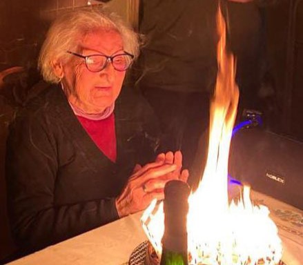 Elderly gran's 95th birthday almost ends in disaster as 95 candles set cake ablaze. Family quickly extinguishes flames, avoiding calamity. Cake remains edible despite wax.