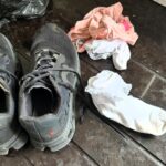 Shopper horrified to find knickers and socks stuffed in second-hand trainers bought online. The seller claimed they were used to prevent creasing in photos. Social media reactions were mixed.