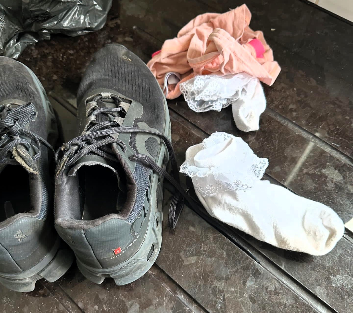 Shopper horrified to find knickers and socks stuffed in second-hand trainers bought online. The seller claimed they were used to prevent creasing in photos. Social media reactions were mixed.