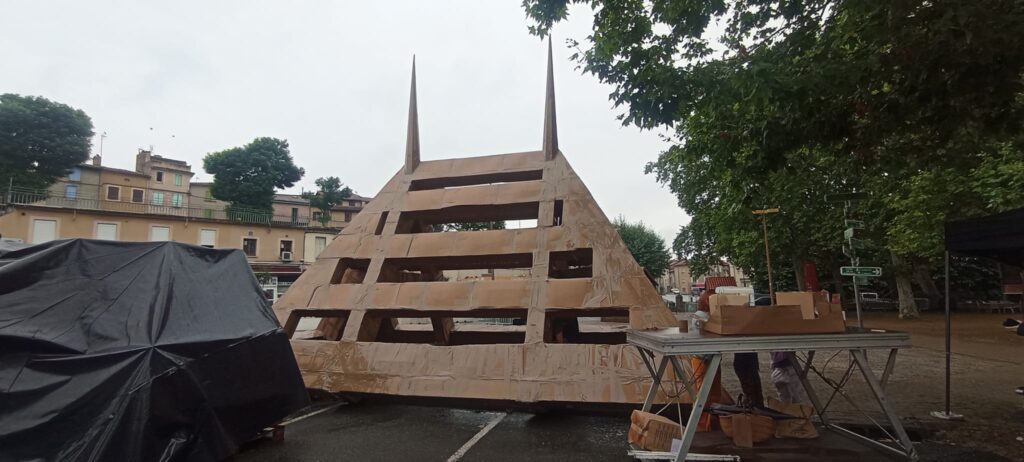 Locals in Graulhet, France, built a 1.5-ton cardboard castle, only to demolish it the next day. The project celebrated a legendary 10th-century castle, uniting the community.