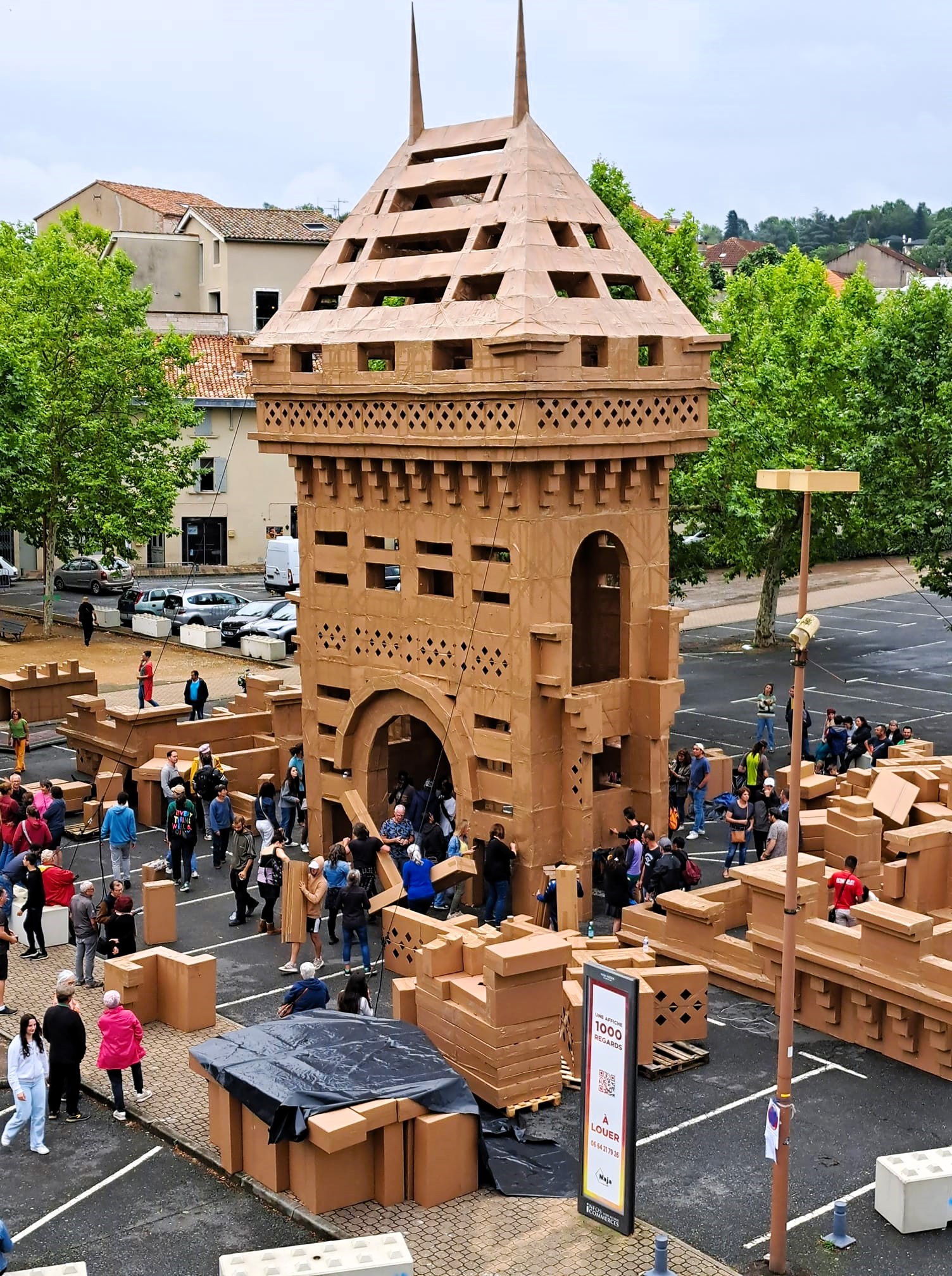 Locals in Graulhet, France, built a 1.5-ton cardboard castle, only to demolish it the next day. The project celebrated a legendary 10th-century castle, uniting the community.