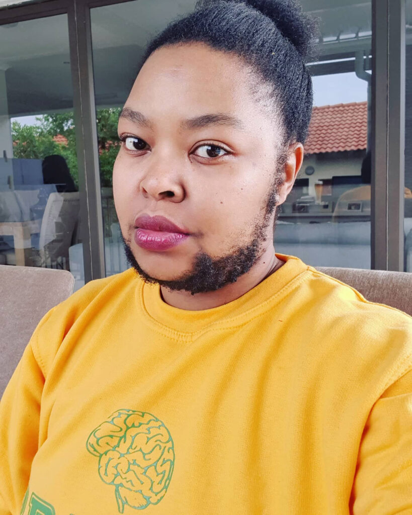 Bearded woman Khosi Nkanyezi Buthelezi shares her summer beard care routine and tips for self-acceptance, embracing her unique look with confidence despite societal reactions.