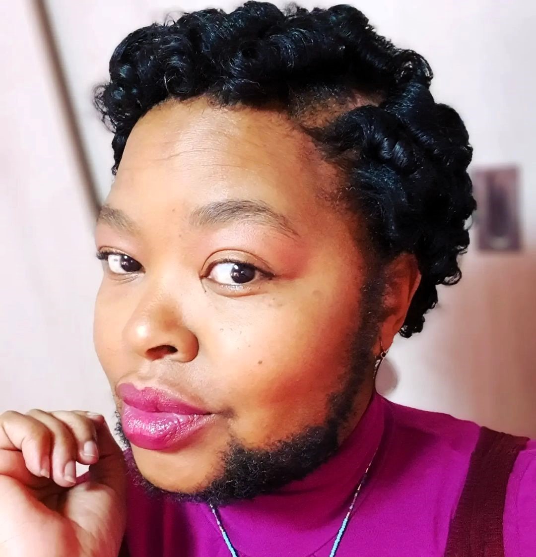 Bearded woman Khosi Nkanyezi Buthelezi shares her summer beard care routine and tips for self-acceptance, embracing her unique look with confidence despite societal reactions.