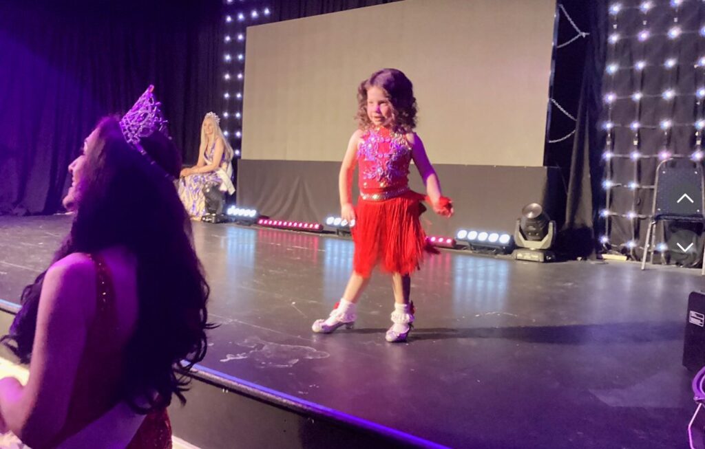 Beauty pageant mum Catherine Oliver spends £2,500 a year on competitions and clothes for her daughter Ava, 5, despite facing criticism from other parents. She remains proud.