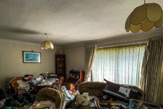 Urban explorer Sean Piper's TikTok video reveals a severely overgrown, abandoned hoarder's home in Kent, filled with damp clothes, animal droppings, and personal belongings.