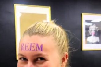 Joey Essex fan Jess Sproule tattoos 'reem' on her manager's forehead to boost social media engagement during Love Island 2024. The non-permanent inking shocks fans online.