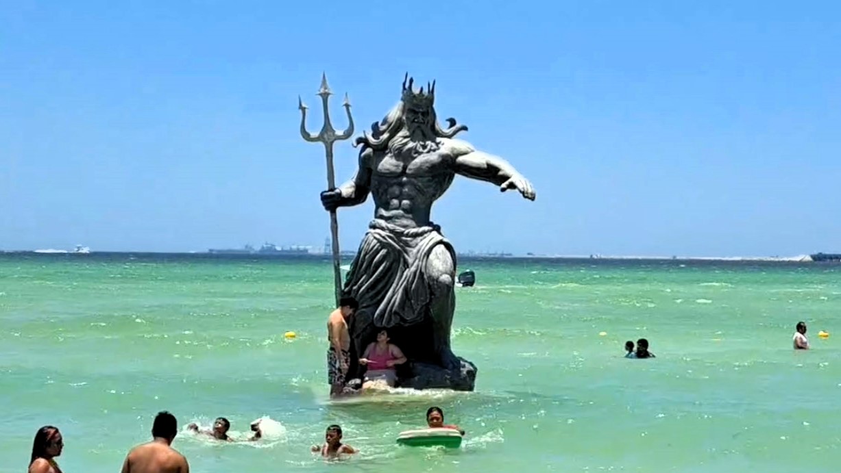 Locals blame a Poseidon statue for Hurricane Beryl, sparking plans for its demolition. The controversial figure, erected to boost tourism, is now linked to adverse weather.