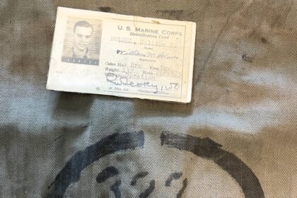 Mark Ryan Holmes discovers the exact WWII uniform his grandfather was wounded in, thanks to historian Austin Wideman. Their reunion with the uniform uncovers a powerful family connection.