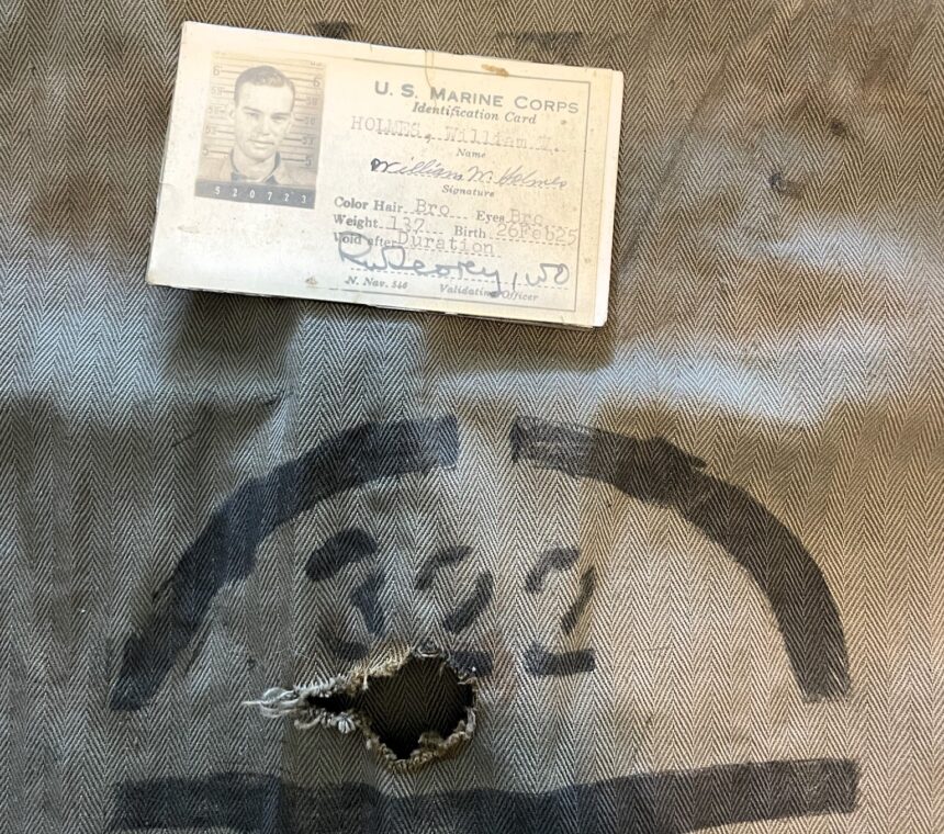 Mark Ryan Holmes discovers the exact WWII uniform his grandfather was wounded in, thanks to historian Austin Wideman. Their reunion with the uniform uncovers a powerful family connection.