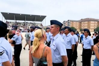 Military wife reunites with husband at Air Force graduation after two months apart. Emotional video captures the heartfelt moment, garnering over six million views.