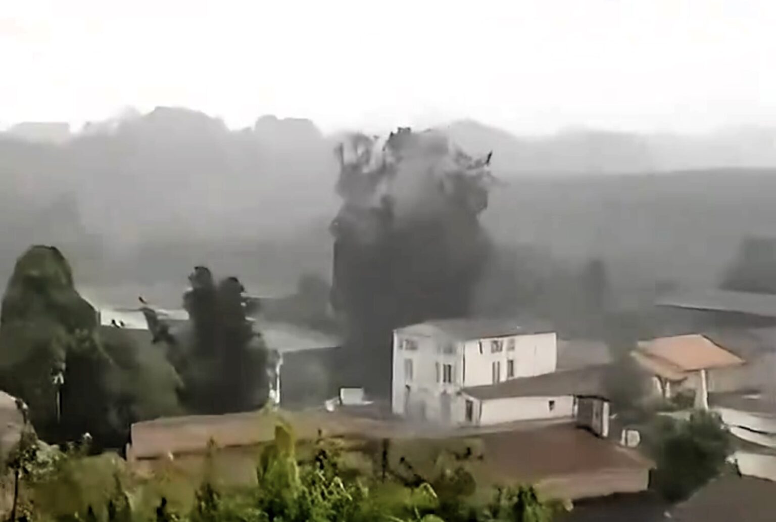 Watch as a massive tree explodes into pieces after a lightning strike in Augé, France. The storm also caused multiple fatalities and severe damage across the region.
