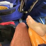 A plane passenger sparked debate by sharing a photo of a bare foot next to her leg on a flight from Bagdogra to Mumbai, India. Reactions were mixed on Reddit.
