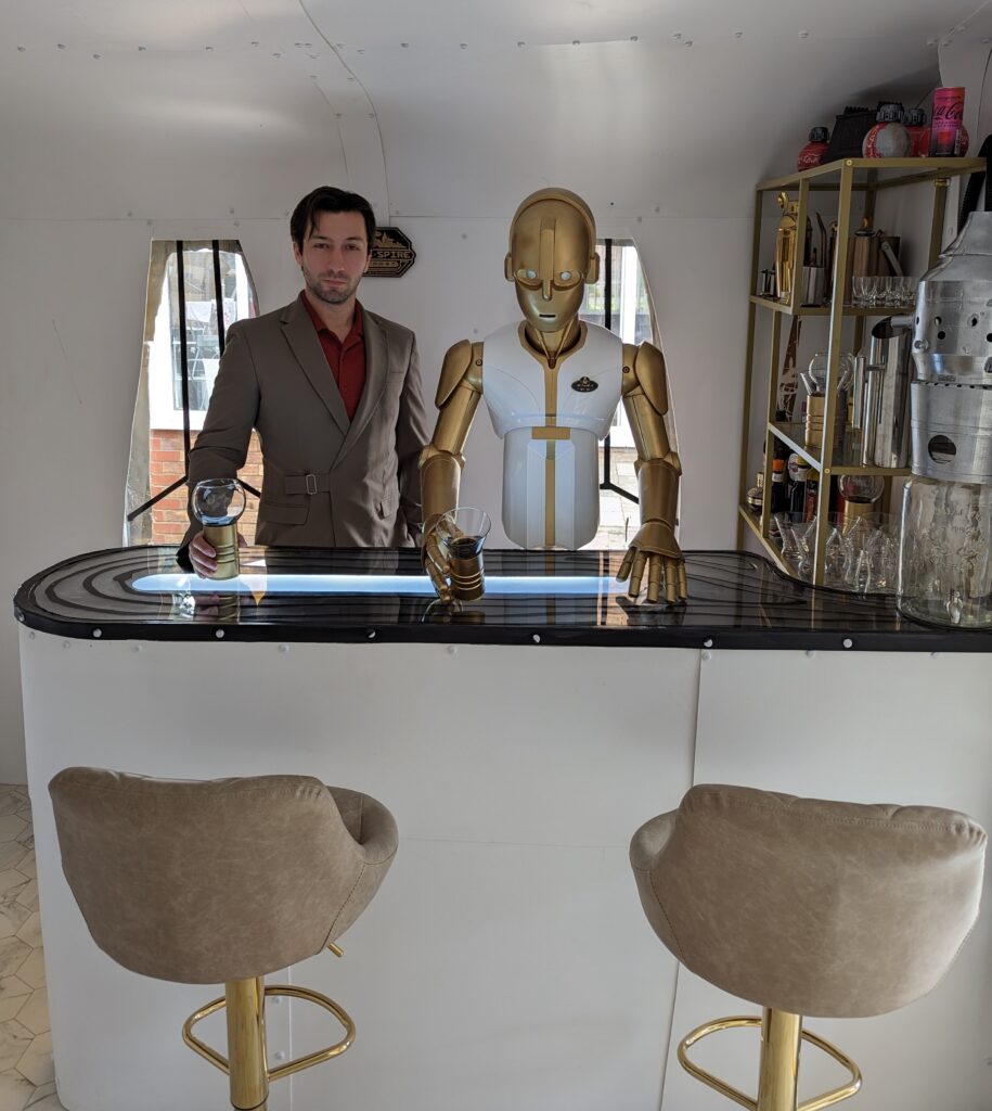 Sci-fi superfan Chester Walsh spent £10,000 and two months building a Star Wars-themed bar in his garden, featuring a droid bartender and inspired by Mos Eisley Cantina.