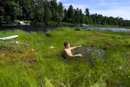 A viral video shows Colton Macaulay sinking into a bog while exploring. The 26-year-old content creator from Nova Scotia narrowly escaped drowning, racking up 6.6M views.