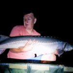 Angler Dave Howarth, 43, catches a 48lb sturgeon in the River Trent, despite the species being thought extinct in Britain. This rare catch revives hope for UK sturgeon.