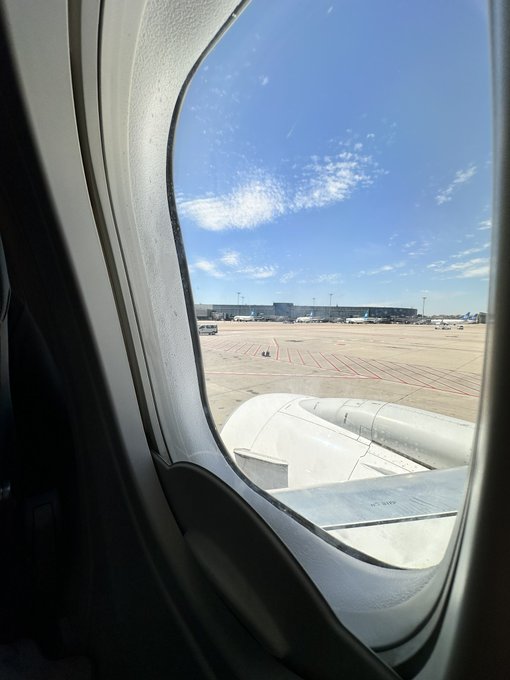 A passenger at Madrid's Barajas airport spotted his family's suitcases left on the tarmac before takeoff. Despite the mishap, their luggage, including cheese, arrived safely later.