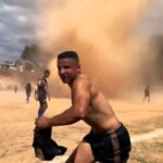 A dust devil halted an amateur football match in Ribeirão das Neves, Brazil. The whirlwind, caught on video, caused a brief pause but no injuries. Watch the dramatic clip.