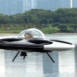 A new ‘UFO taxi’ with 12 battery-powered motors can take off and land on water. It flies up to 650 feet for 15 minutes, carries two passengers, and offers scenic rides in Shenzhen.