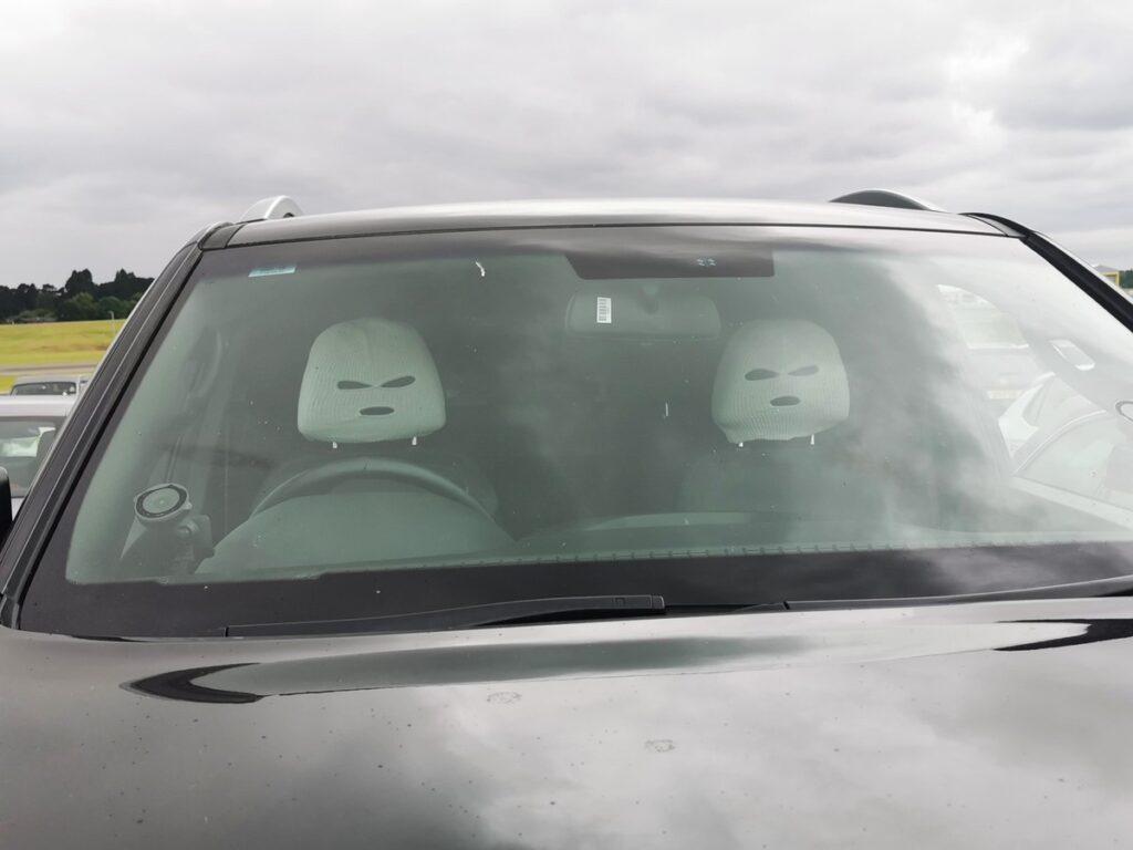 Police at Birmingham Airport spot headrest covers mistaken for bank robbers. The prank follows a similar incident from March, sparking humorous reactions online.