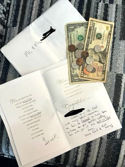 A random couple crashed a wedding, leaving a handwritten card and $11.54 as a gift. The unique incident, shared on social media, garnered over 33,000 likes and many amused comments.