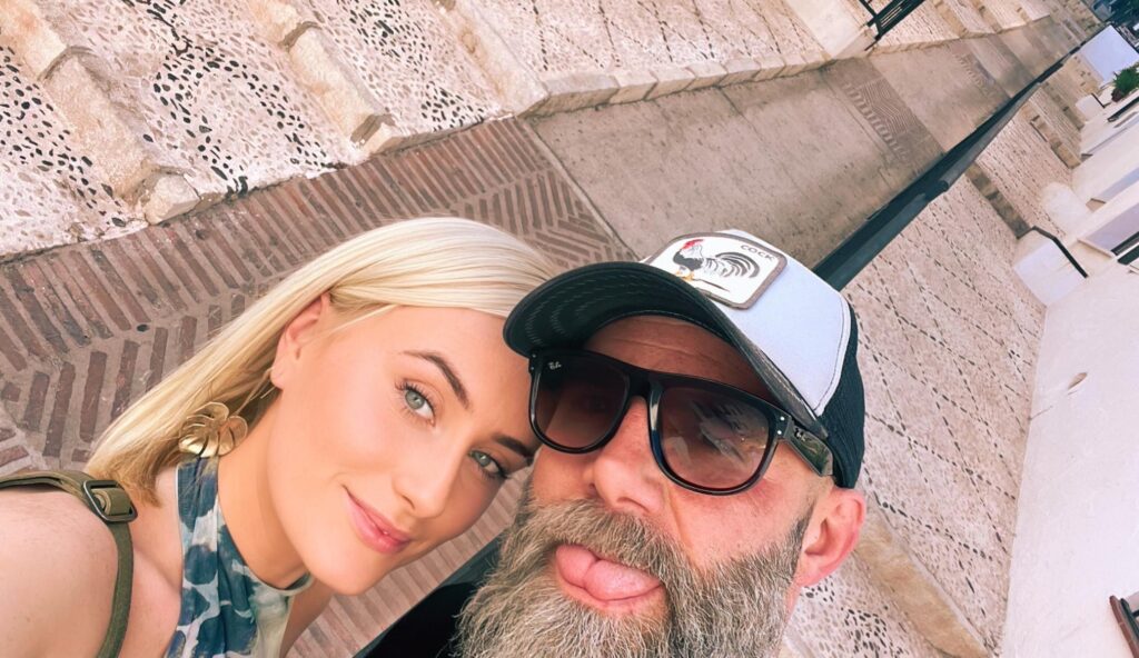 Maisy Smith, 26, from Birmingham, shares her happiness dating 49-year-old Cy Tunnicliff despite criticism. Their love overcomes a 23-year age gap and societal norms.