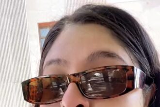 Woman claims she was fired for attending her father's funeral, sharing her story on TikTok where it went viral with 4.3 million views. Former employer denies the allegations.