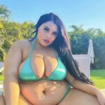 Body-positive influencer Alex Aspasia, 30, embraces her curves in bikinis this summer, spreading confidence and challenging beauty standards. Her message: Love your body unapologetically.