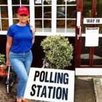 Controversial mum Carla Bellucci claims she was asked to leave a polling station for wearing a MAGA hat, sparking outrage in her Hertfordshire village. She backs Rishi Sunak.