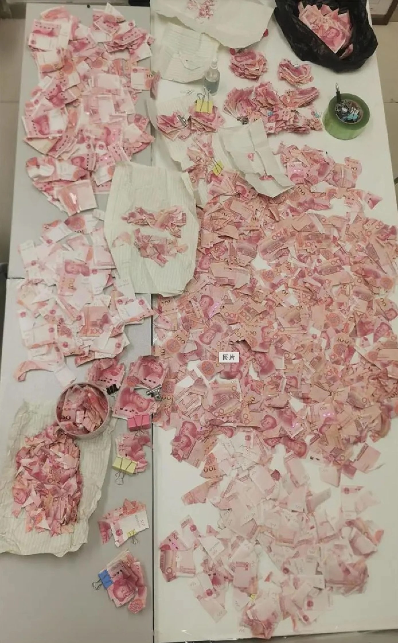 Bank workers in China painstakingly piece together £3,450 in damaged notes after a woman cut up her savings. Their 22-day effort aids a struggling family in need.