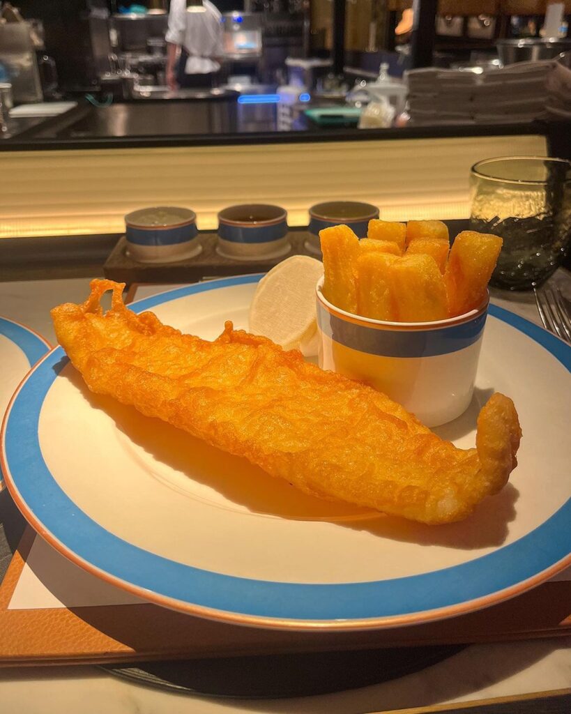 Chef Tom Kerridge hosts exclusive £270 fish and chips evening at Harrods amid pub closure crisis. Event promises premium seafood and wine pairings. Tickets available for September 18.