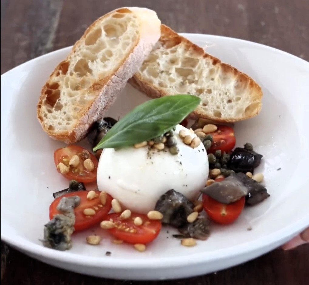 Gordon Ramsay's £14 burrata dish at Heathrow's Plane Food faces backlash for its high price, with social media users comparing it to a budget meal. Reviews are mixed.