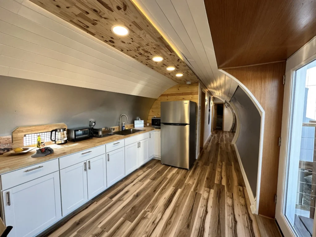 Experience a unique stay in a converted DHL jet turned Airbnb, complete with a wing deck and sauna, nestled in the breathtaking Alaskan wilderness. Book now for an unforgettable adventure!