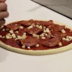 Gordon Ramsay faces backlash for his bottomless pizza, with some customers comparing it to Wetherspoons, while others praise the dish as a culinary masterpiece.