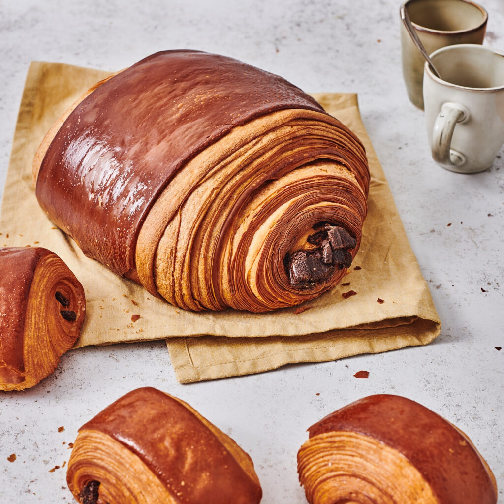 Phillippe Conticini's famous XXXL croissant in London drops to £20, but only at the new Islington boutique. Indulge in this viral treat, perfect for sharing with friends and family.