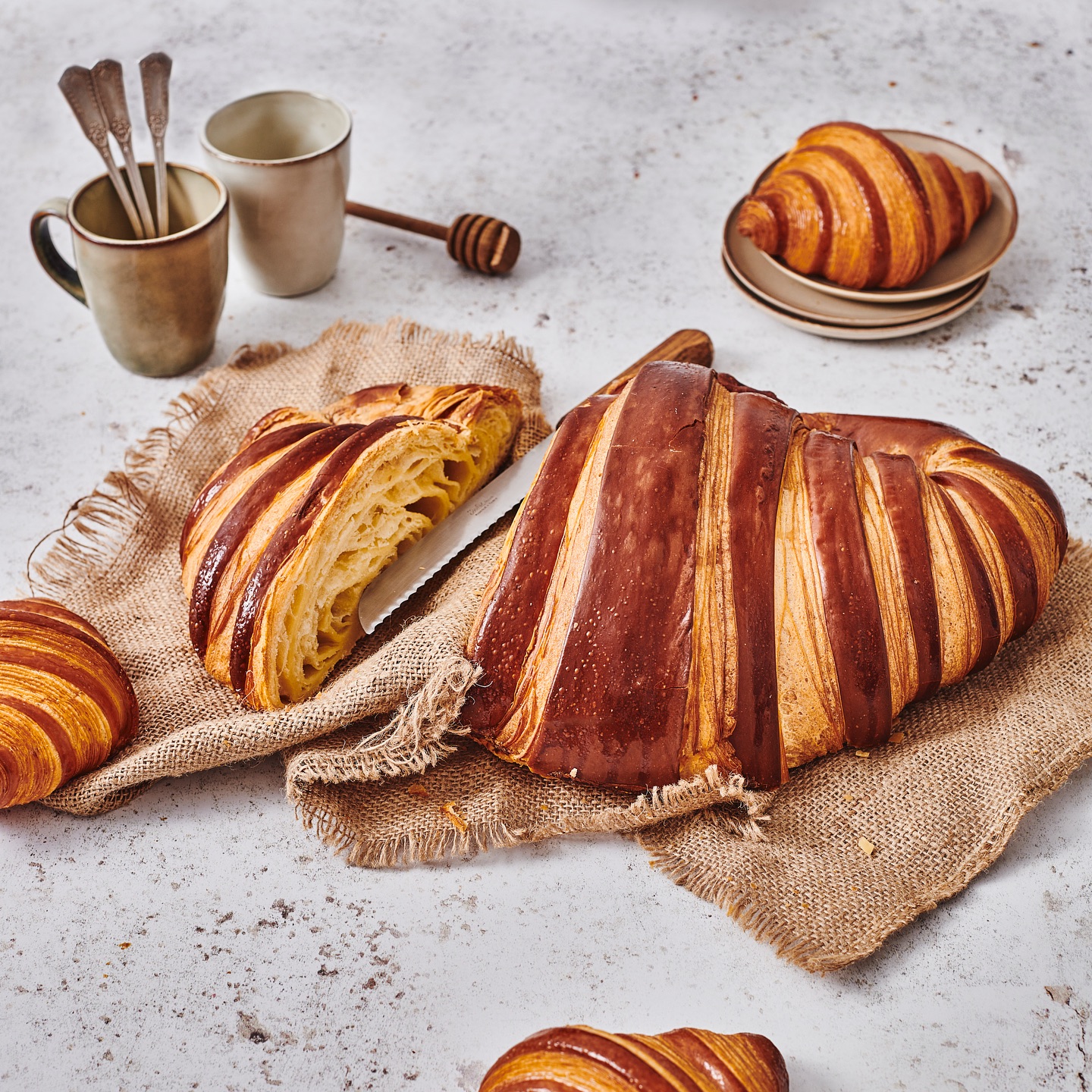 Phillippe Conticini's famous XXXL croissant in London drops to £20, but only at the new Islington boutique. Indulge in this viral treat, perfect for sharing with friends and family.