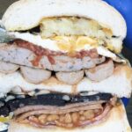 Yorkshire eatery creates the UK's biggest breakfast sarnie, a 6-pound, 5,000-calorie feast. Finish it in 30 minutes for a free meal, or pay £22.50 for the ultimate challenge!