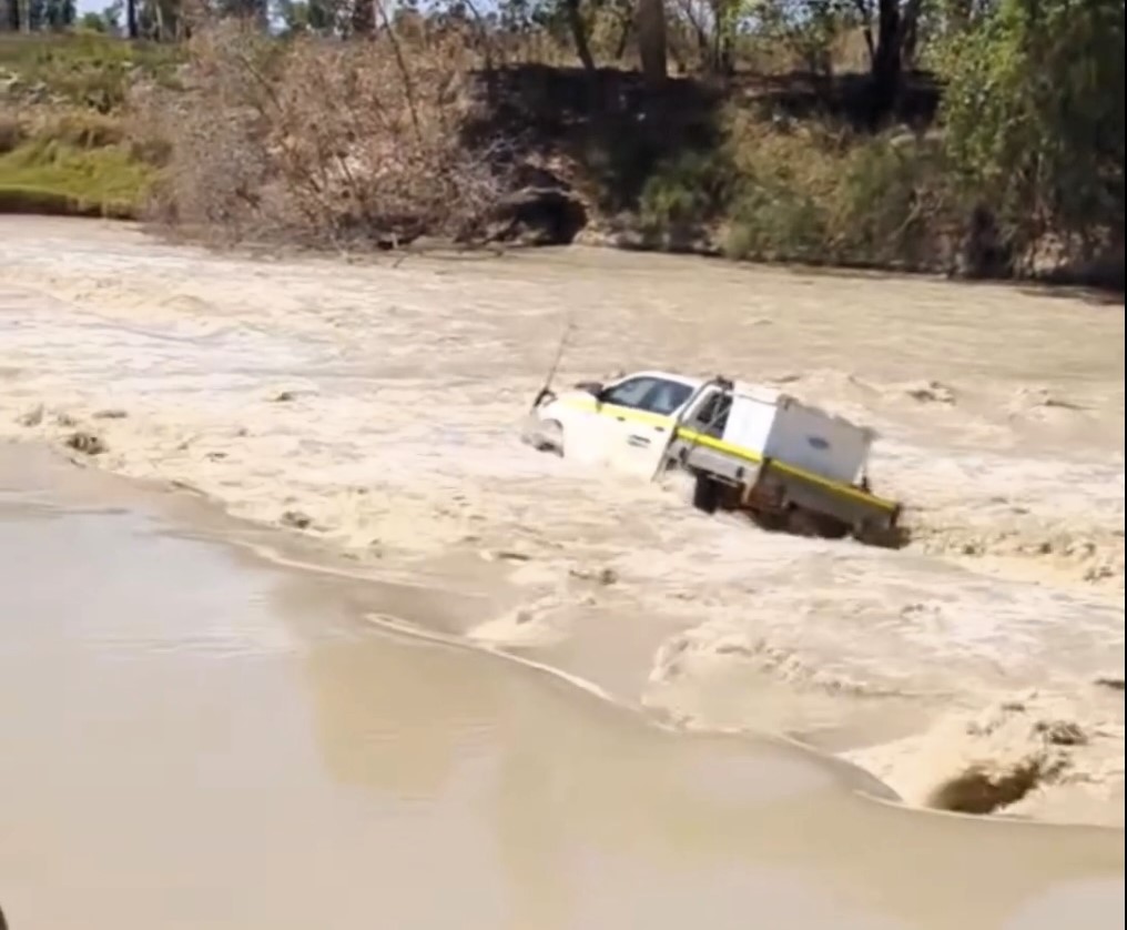 A daring driver learns his lesson after getting stuck in crocodile-infested waters at Cahill's Crossing, with the viral video leaving viewers stunned by his narrow escape.