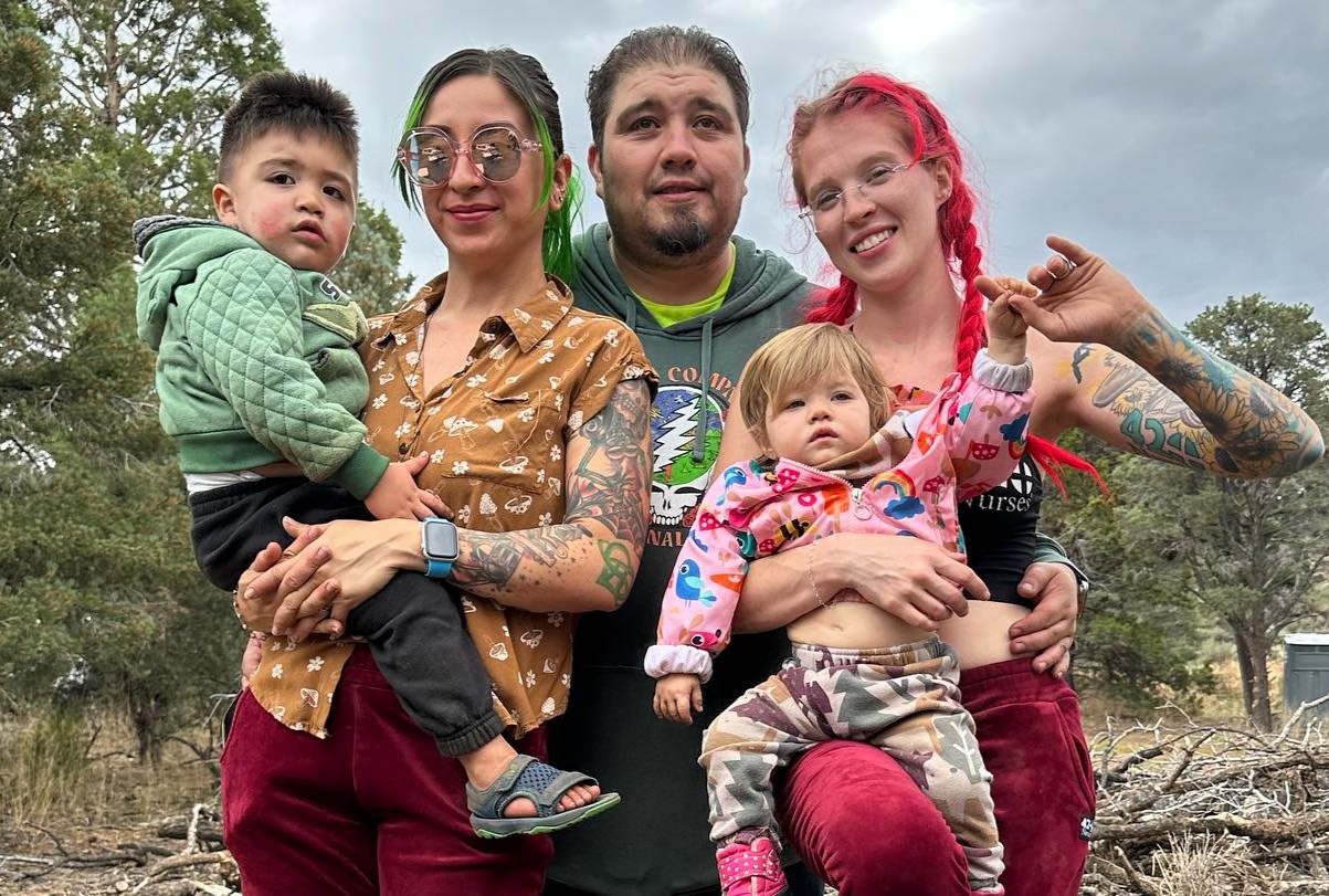 Polyamorous throuple shares their journey of love and challenges, from attacks to acceptance, as they prepare to raise their kids on a new off-grid ranch in Santa Clarita.