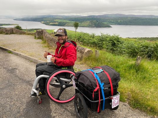 Paralyzed man Peter Smorthit defies the odds, traveling 1,000+ miles across the UK in his wheelchair, raising £12,000 for charity and inspiring others to pursue their dreams.