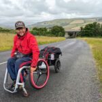 Paralyzed man Peter Smorthit defies the odds, traveling 1,000+ miles across the UK in his wheelchair, raising £12,000 for charity and inspiring others to pursue their dreams.