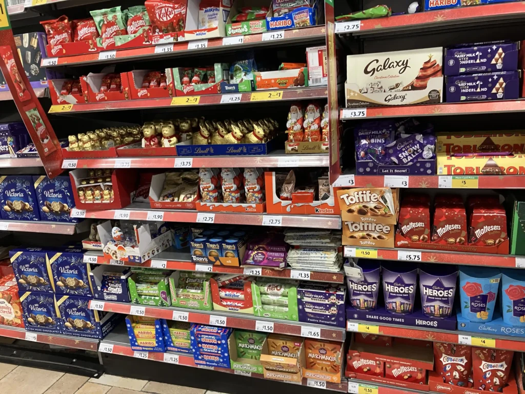 Morrisons faces backlash for selling Christmas treats in August with knockdown prices, sparking debate over early festive sales amid summer temperatures.